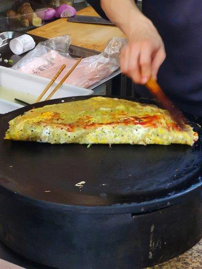 解压找茬烧脑第402关煎饼果子帮她制作煎饼怎么通关